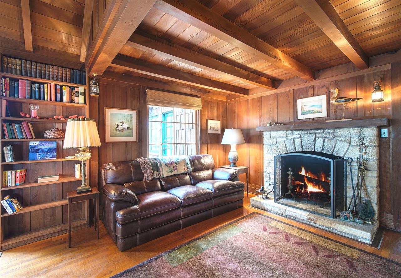 The Living Room  WoodBurning Carmel Stone Fireplace