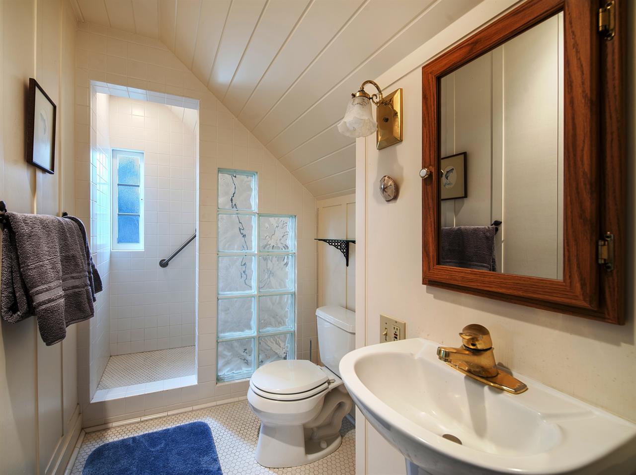 Upstairs En Suite Bathroom with a Shower