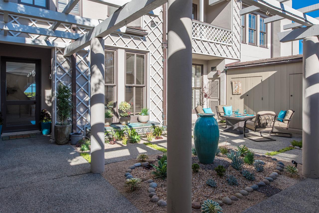 Private Enclosed Front Entry Courtyard