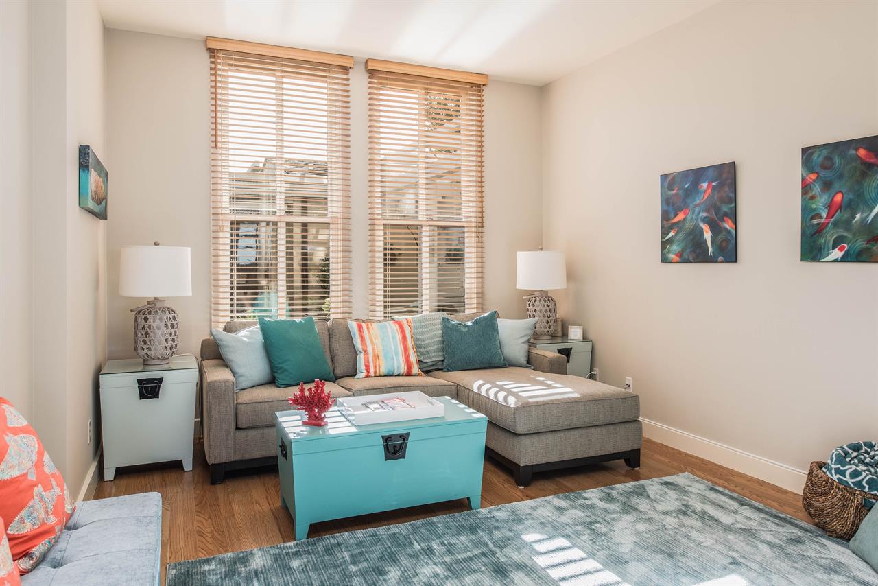 Den has a 50inch HDTV and a HalfBath Nearby