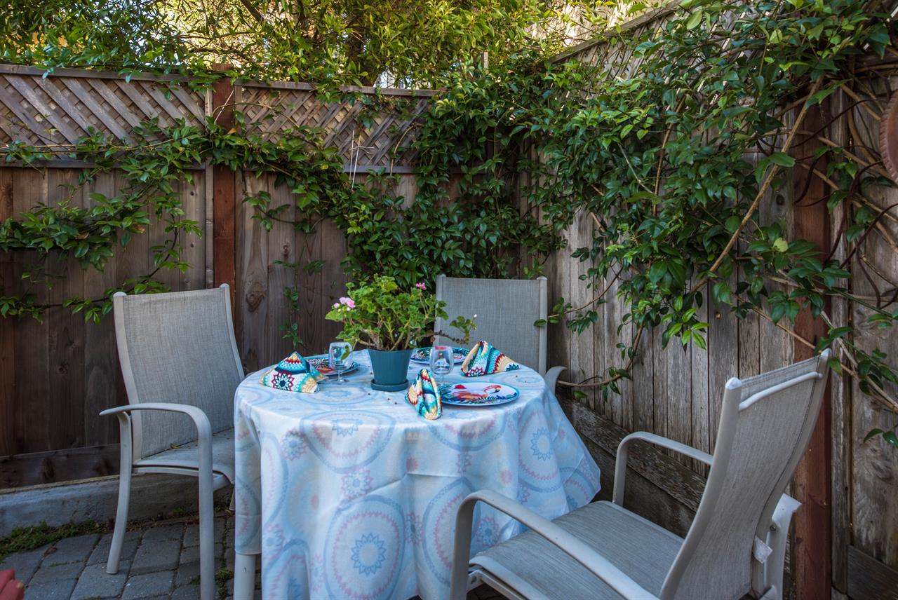 Outdoor Seating and a Gourmet Gas Grill on the Back Patio
