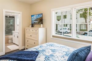 Bedroom 1 has a Queen Bed, HDTV and an En Suite Bathroom