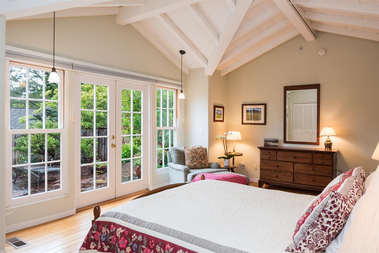 Bedroom 1  Queen Bed, Desk, Patio Access, En Suite Bath