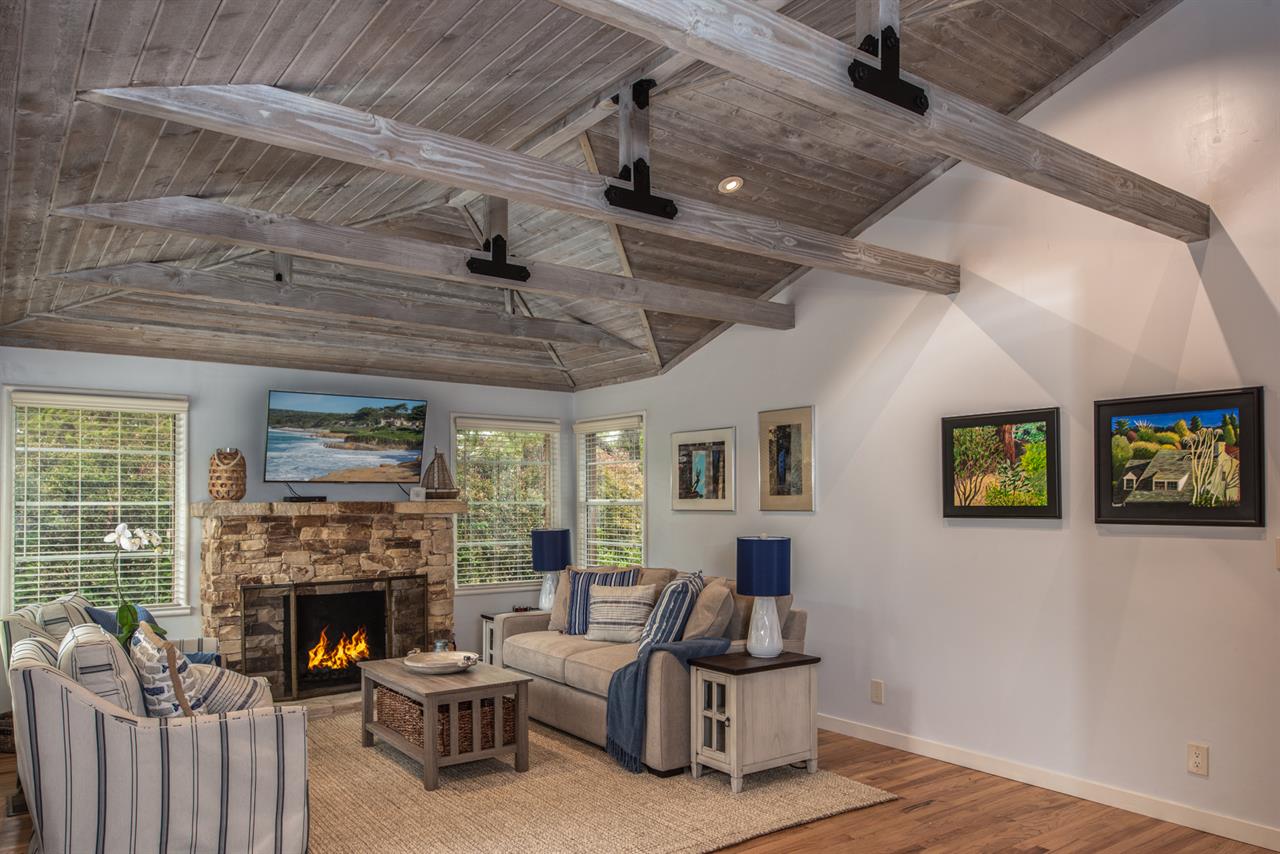 Living Room  Beam Ceiling and Carmel Stone Gas Fireplace