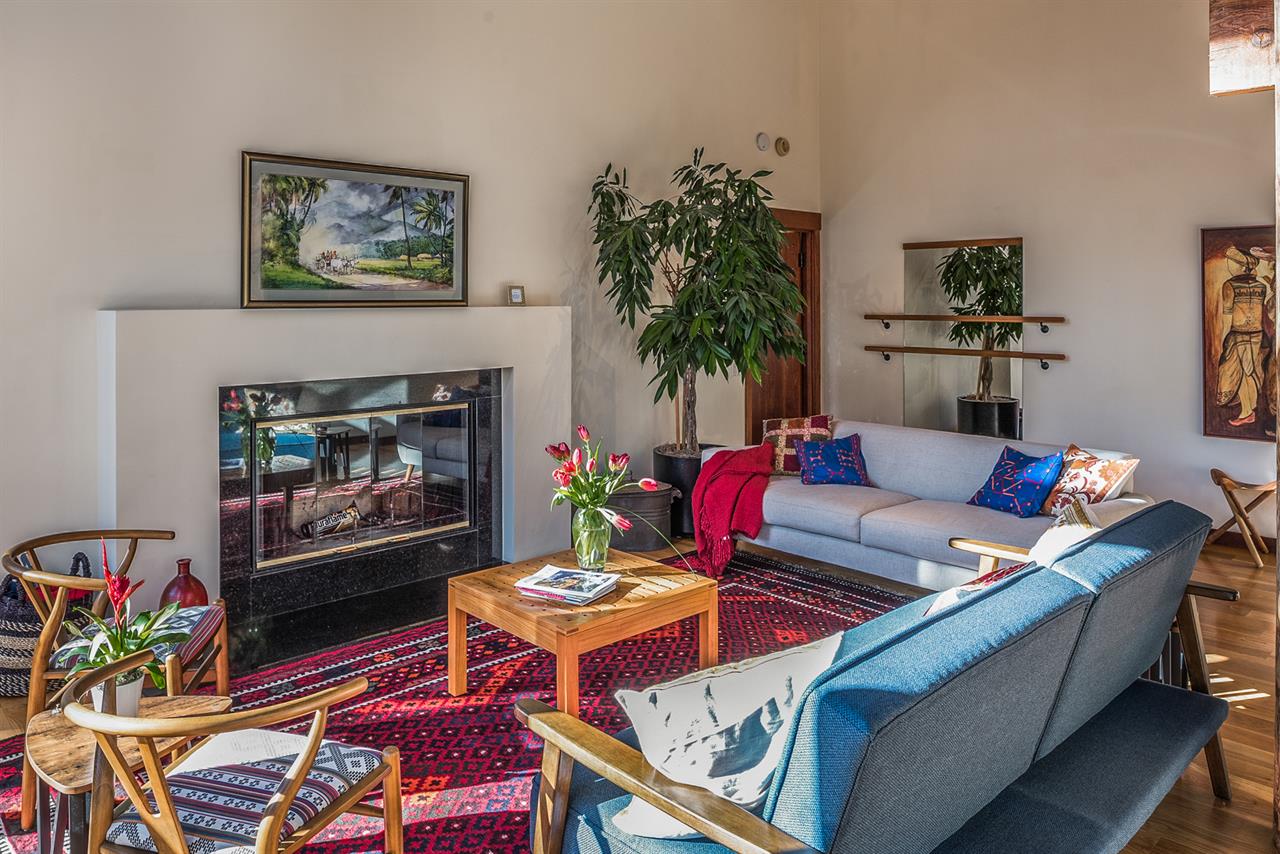 Lofty Living Room with a Fireplace