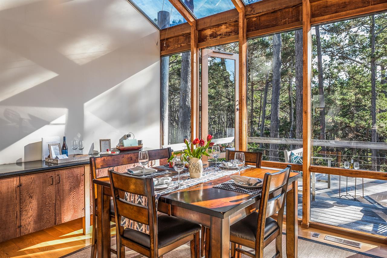Floor to Beyond Ceiling Windows Bring Nature Indoors