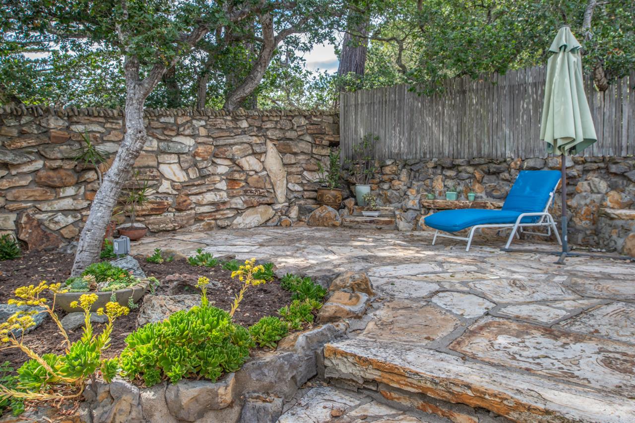 Terraced Patios and Stone Privacy Wall