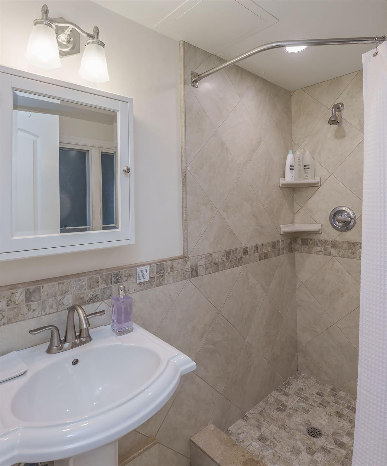 Bedroom 4 En Suite Bathroom has a Shower