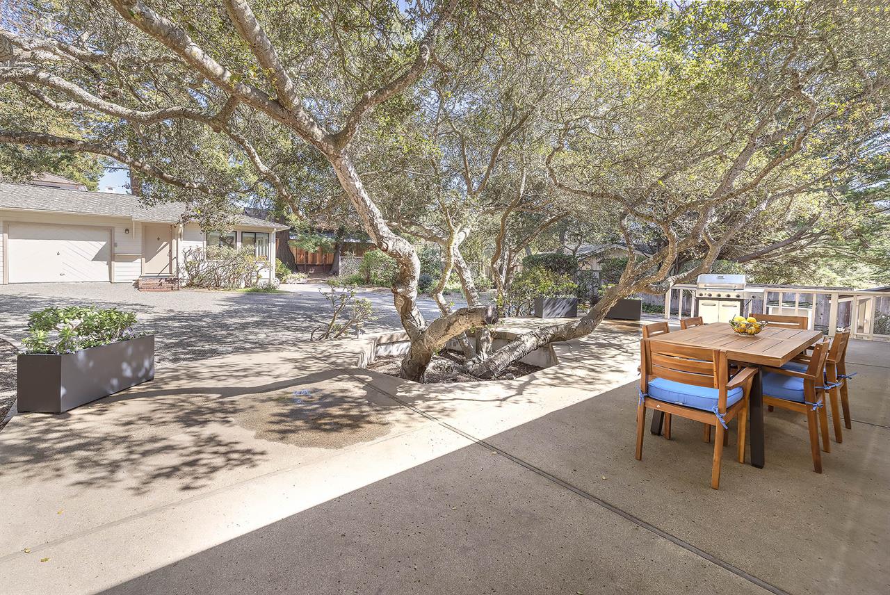 Backyard Patio Dining Area with Propane Grill