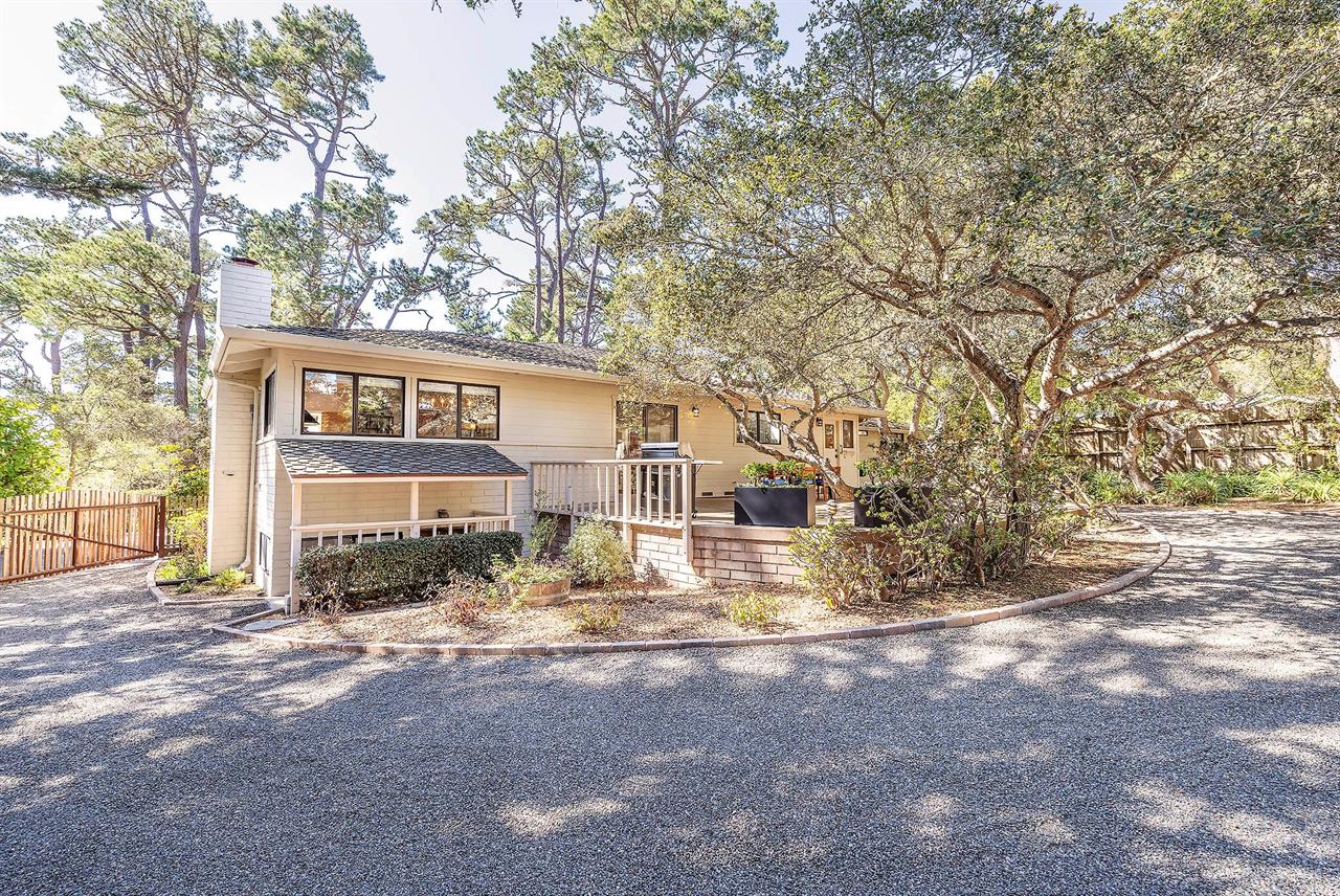 Rear of Home, Gravel Driveway to Garage