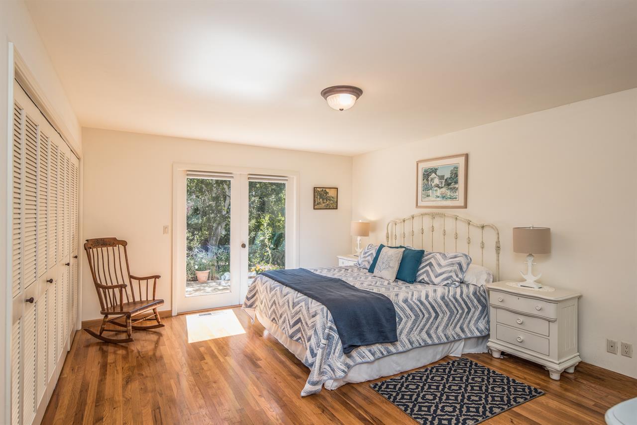 Bedroom 1  King Bed, EnSuite Bath, Patio Access