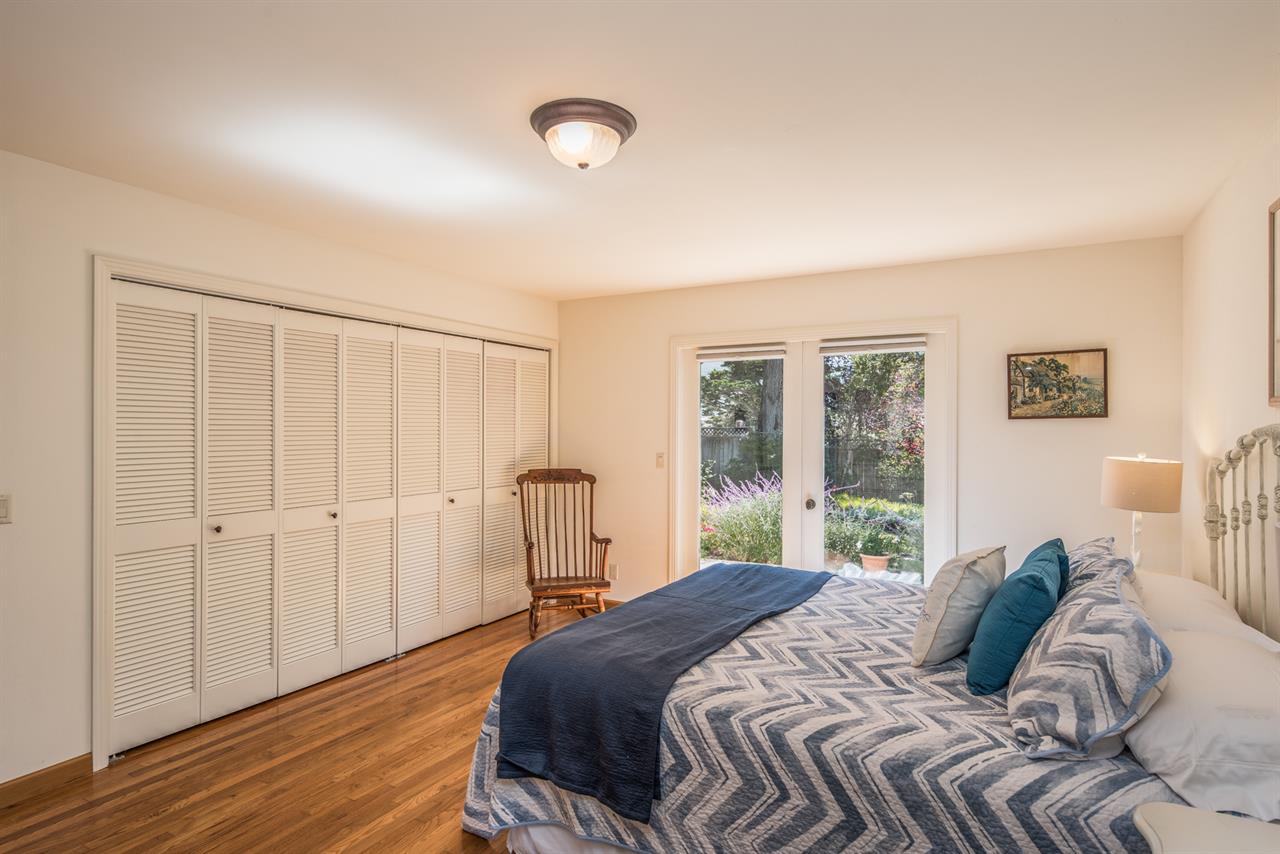 Bedroom 1  King Bed, EnSuite Bath, Patio Access