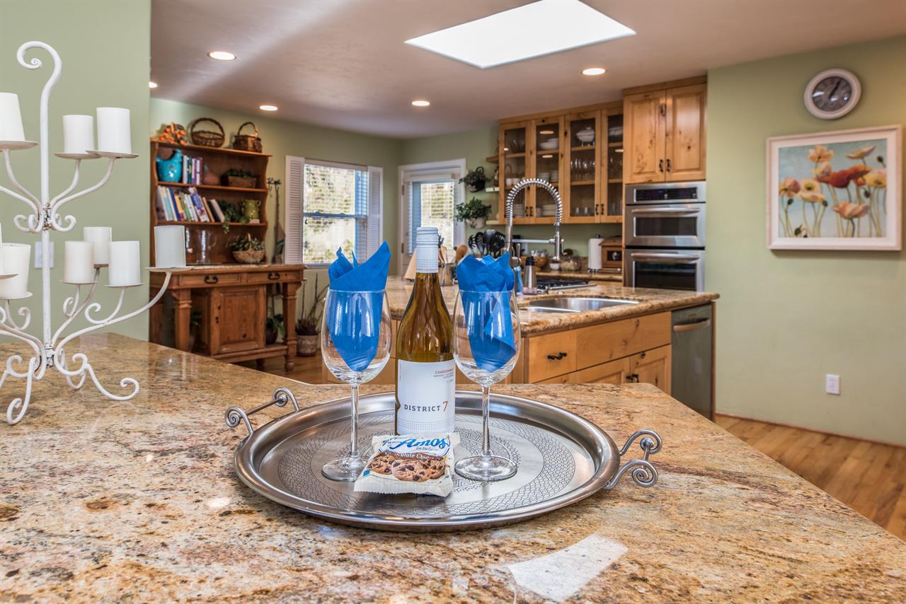 Complementary Wine and Goodies to Welcome You