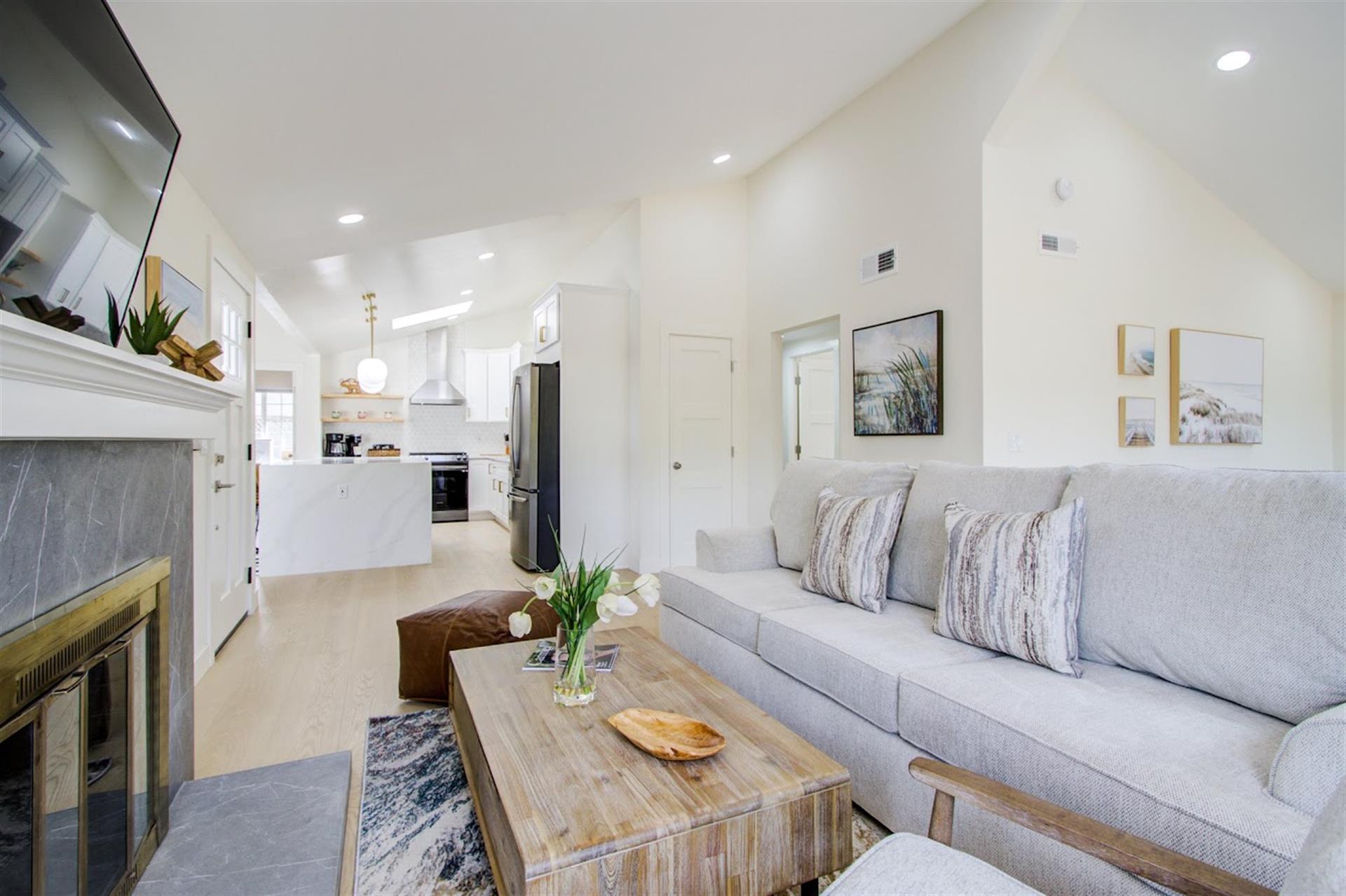 Living Room with Decorative Fireplace and HDTV