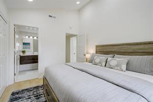 Bedroom 1  King Bed, En Suite Bath with Shower Over Tub