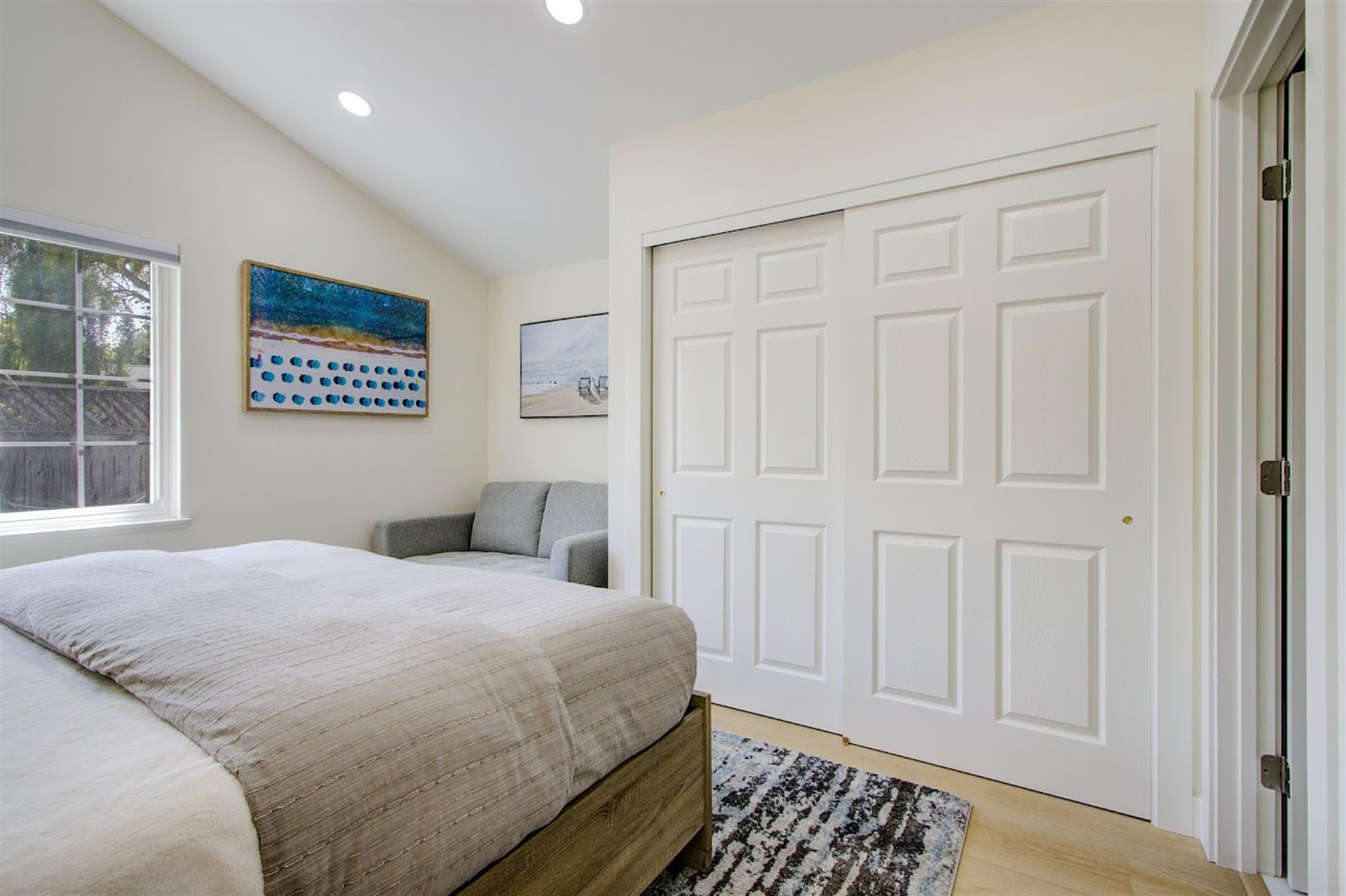 Bedroom 1  King Bed, En Suite Bath with Shower Over Tub