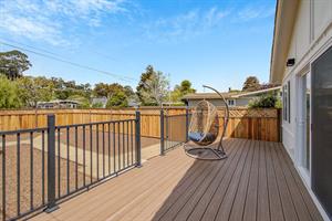 Fenced Front Yard with Deck