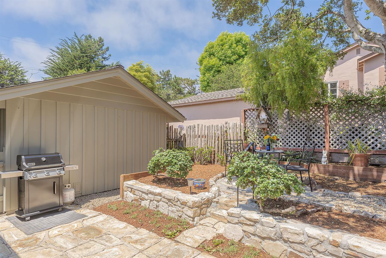 Backyard has a Gas BBQ Grill