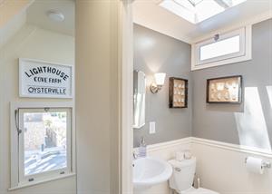 Upstairs  Bathroom has a ClawFoot Tub  Shower Combo