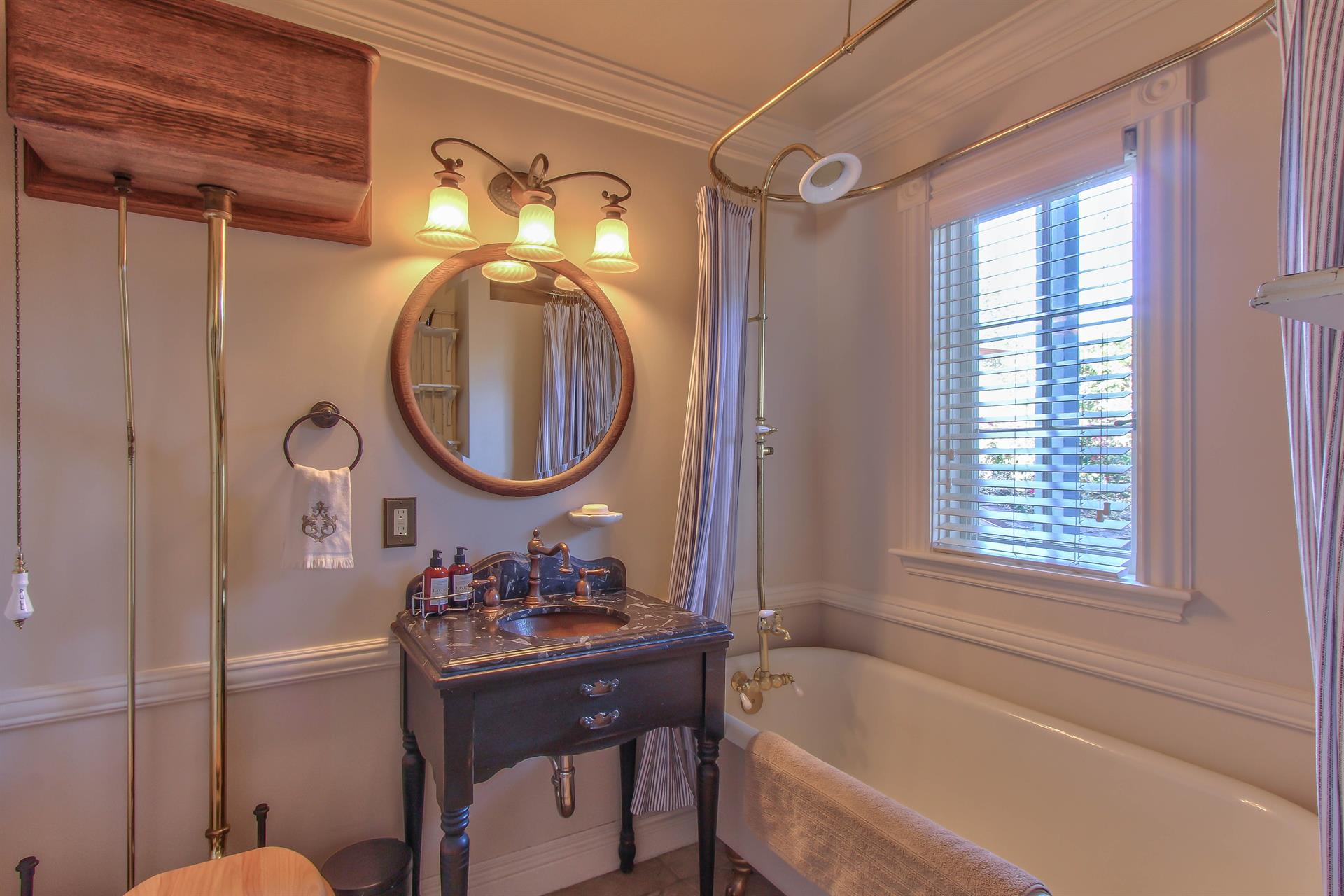 First Floor Bathroom has a Shower Over Claw Foot Tub