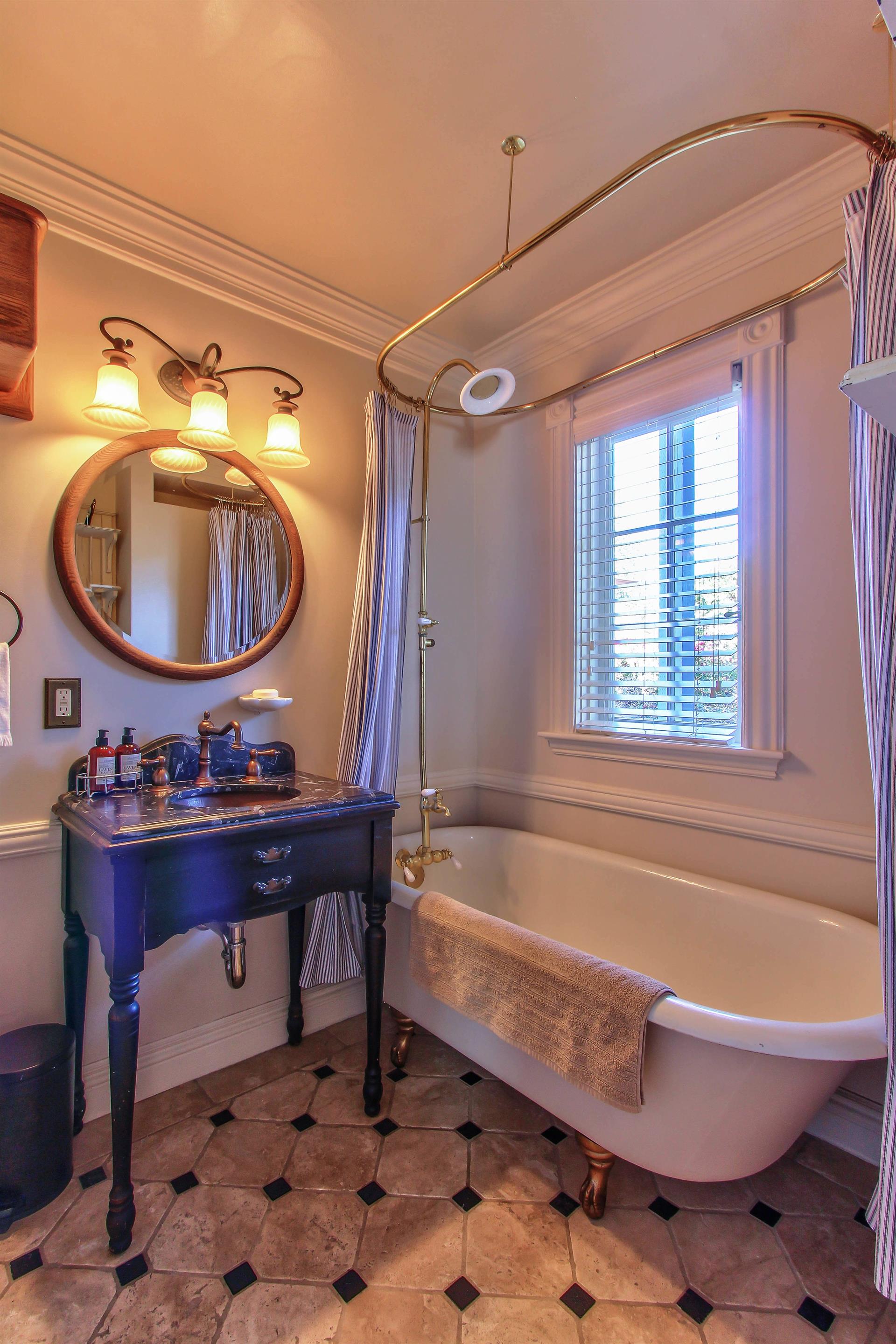 First Floor Bathroom has a Shower Over Claw Foot Tub