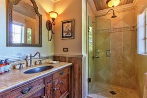 Second Floor Bathroom has a Shower and Antique Vanity