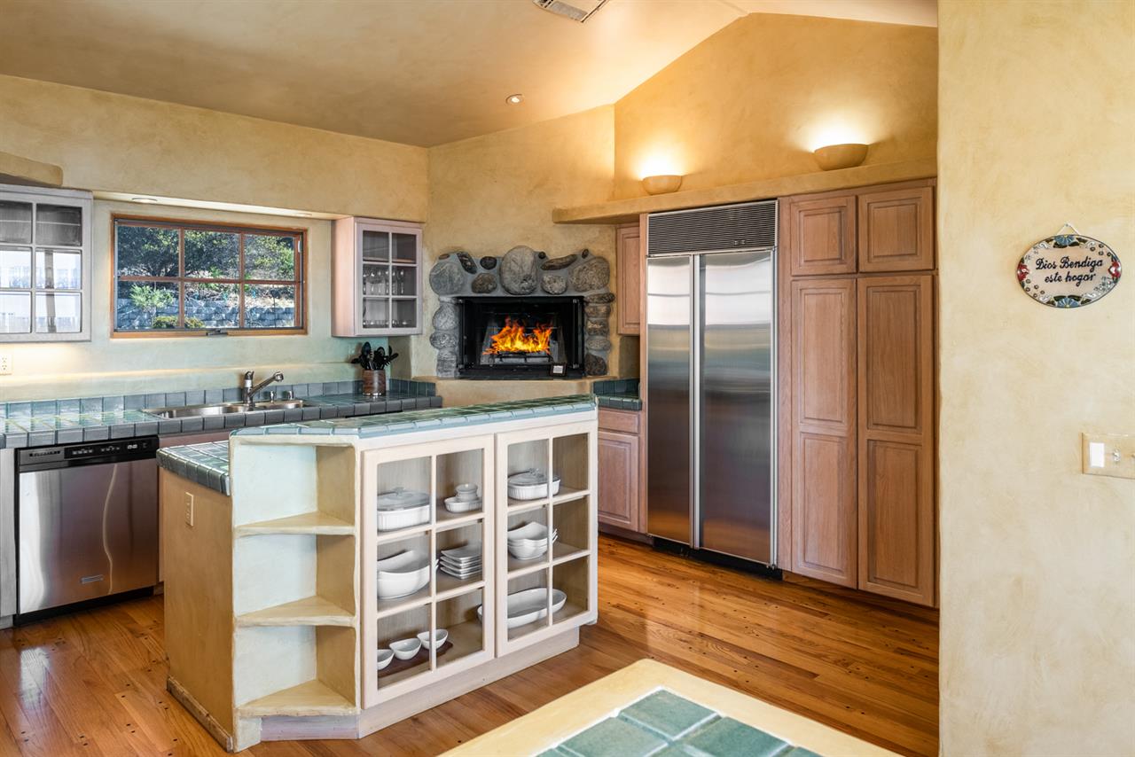 Fully Equipped Chefs Kitchen with Fireplace