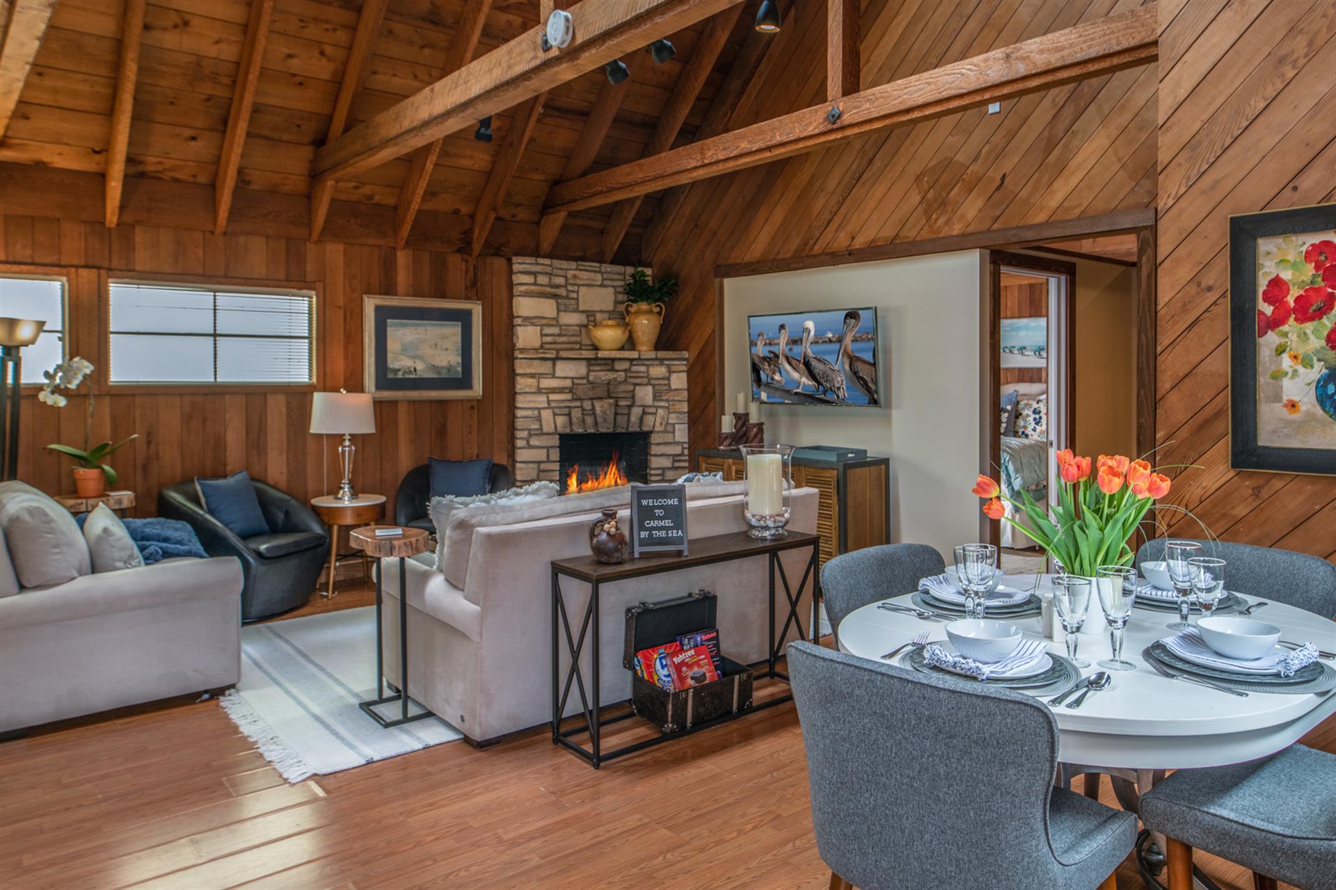 Living Room with Fireplace, HDTV and Dining Area