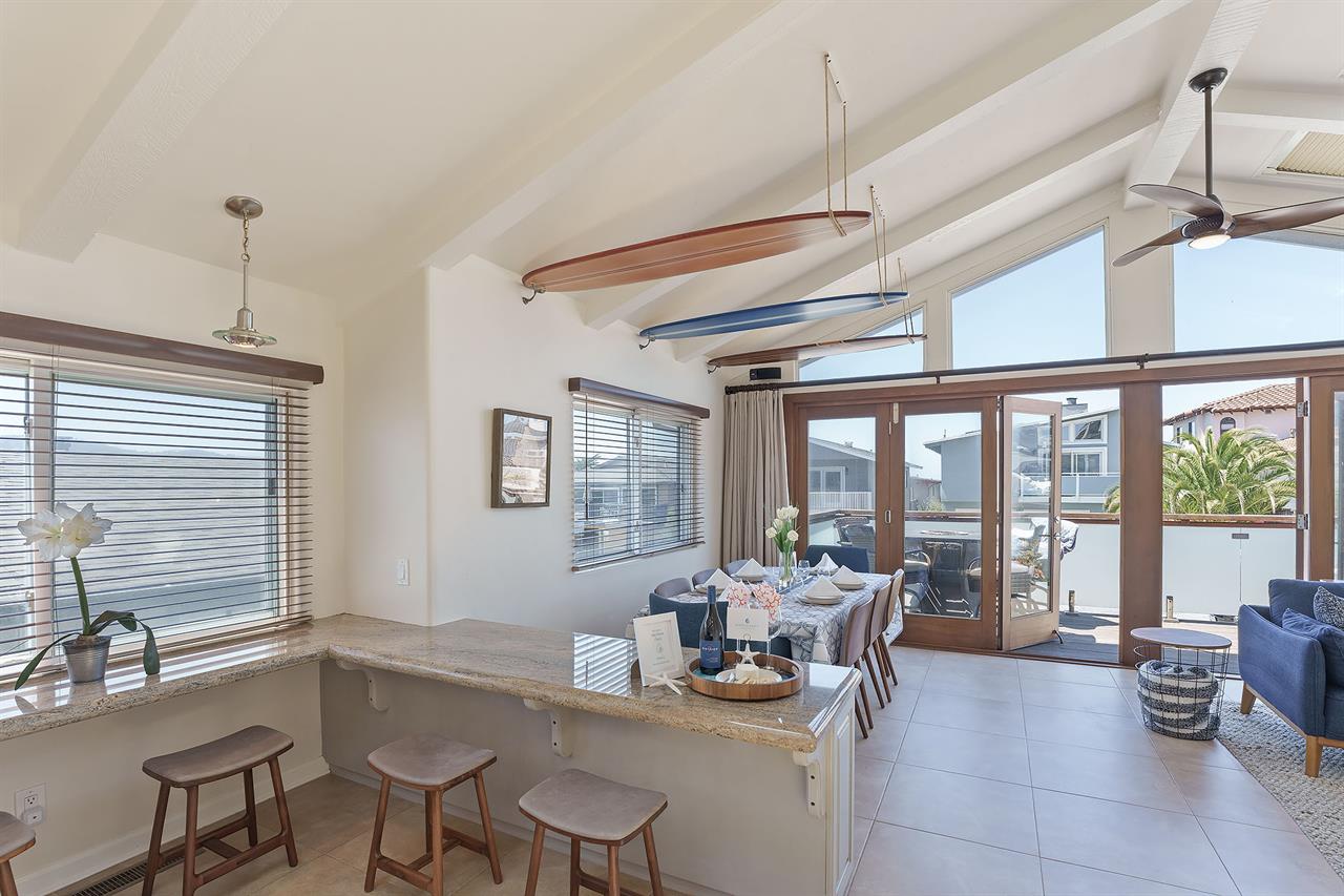 View from the Kitchen to the Dining Area and Front Balcony