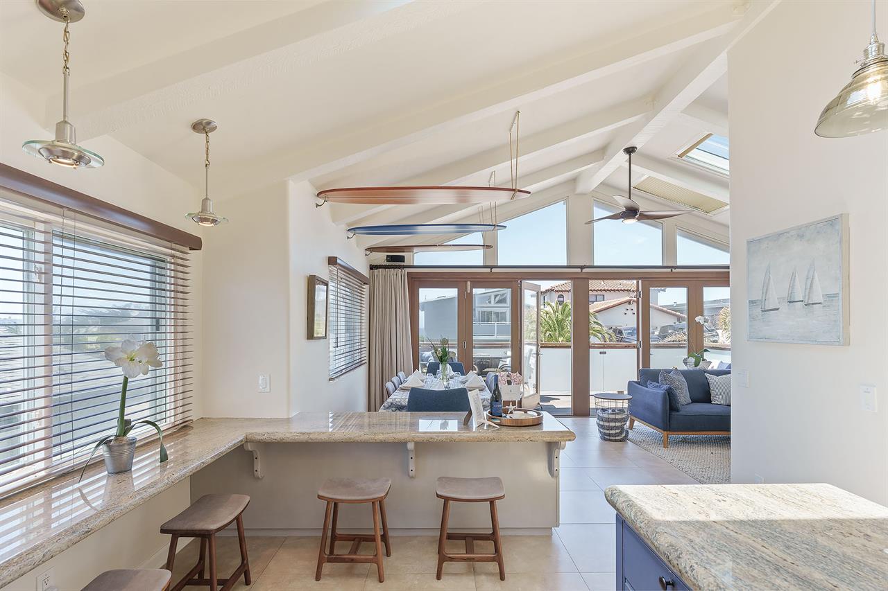 View from the Kitchen to the Dining Area and Front Balcony