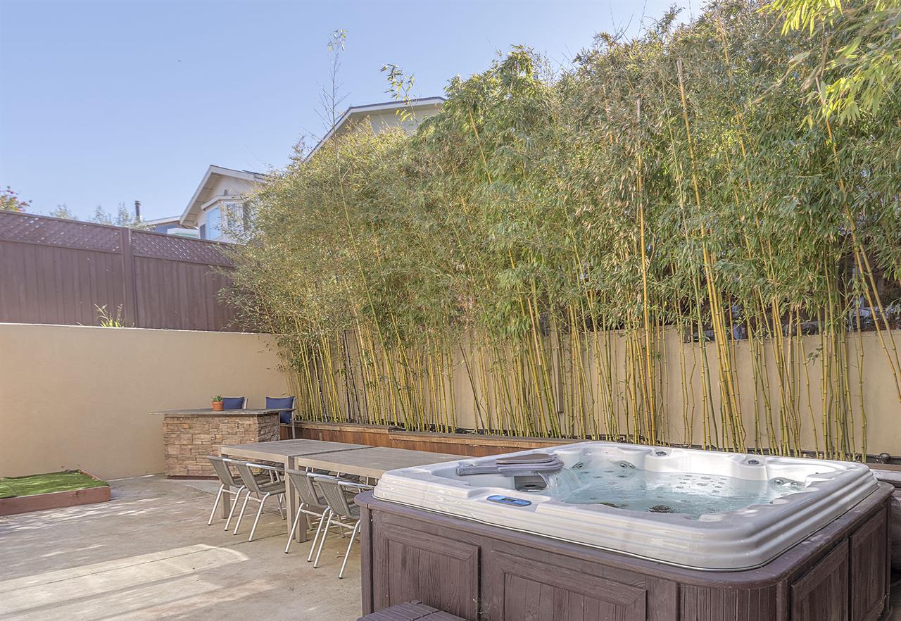 Outdoor Living Space with Dining and Hot Tub