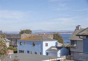 The home is just a short walk to the sea.