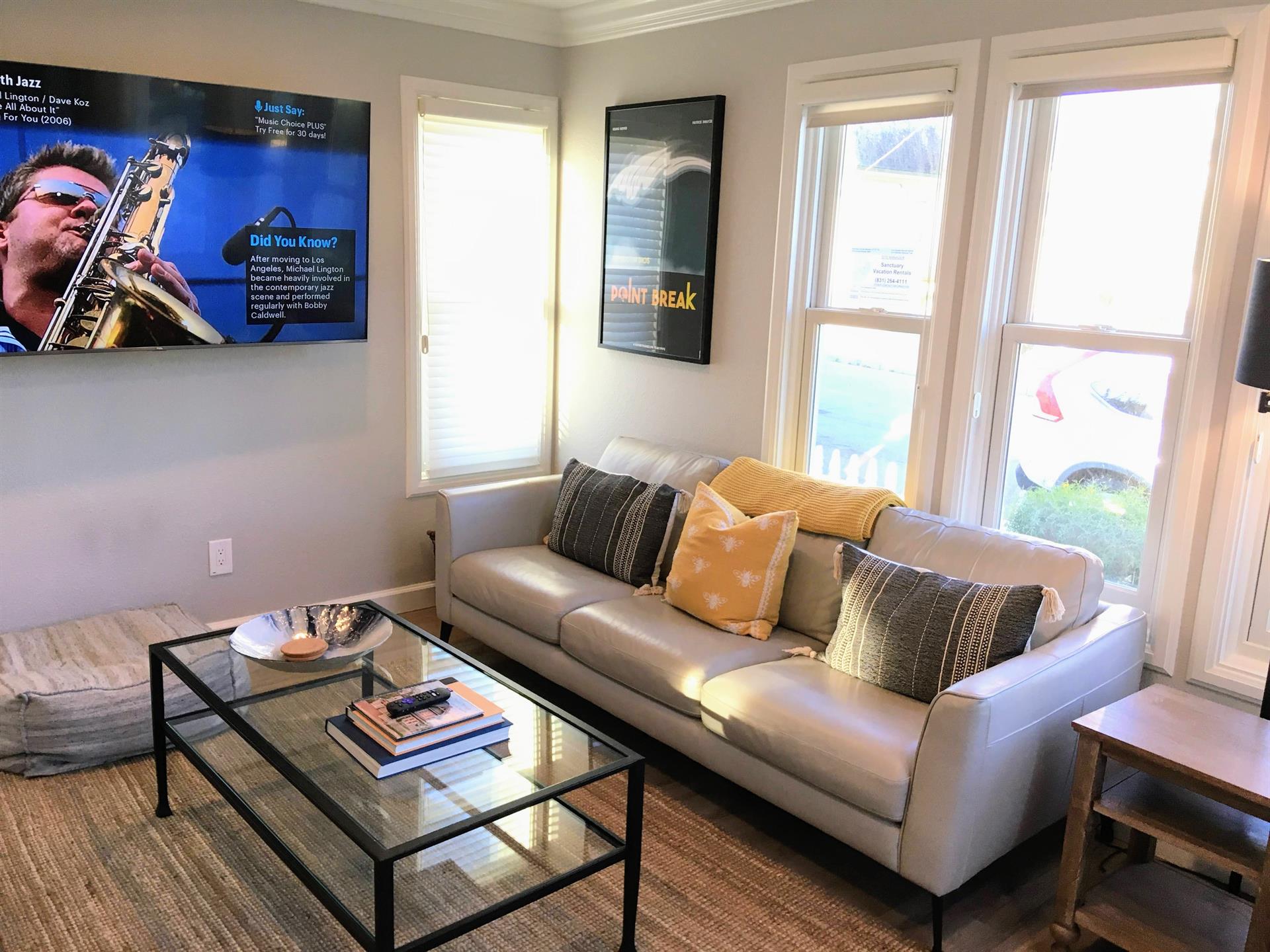 Living Room has a 65inch HDTV