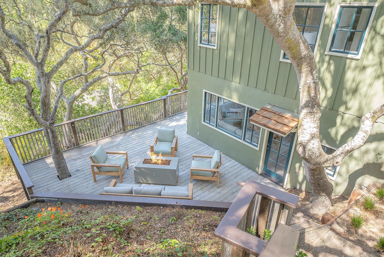 Outdoor Living Area Off the Family Room with a Fire Pit