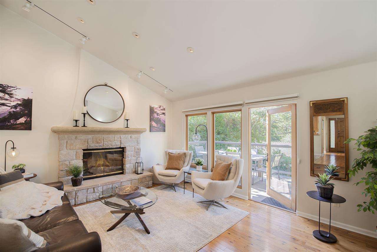 Living Room with Fireplace and Vaulted Ceilings