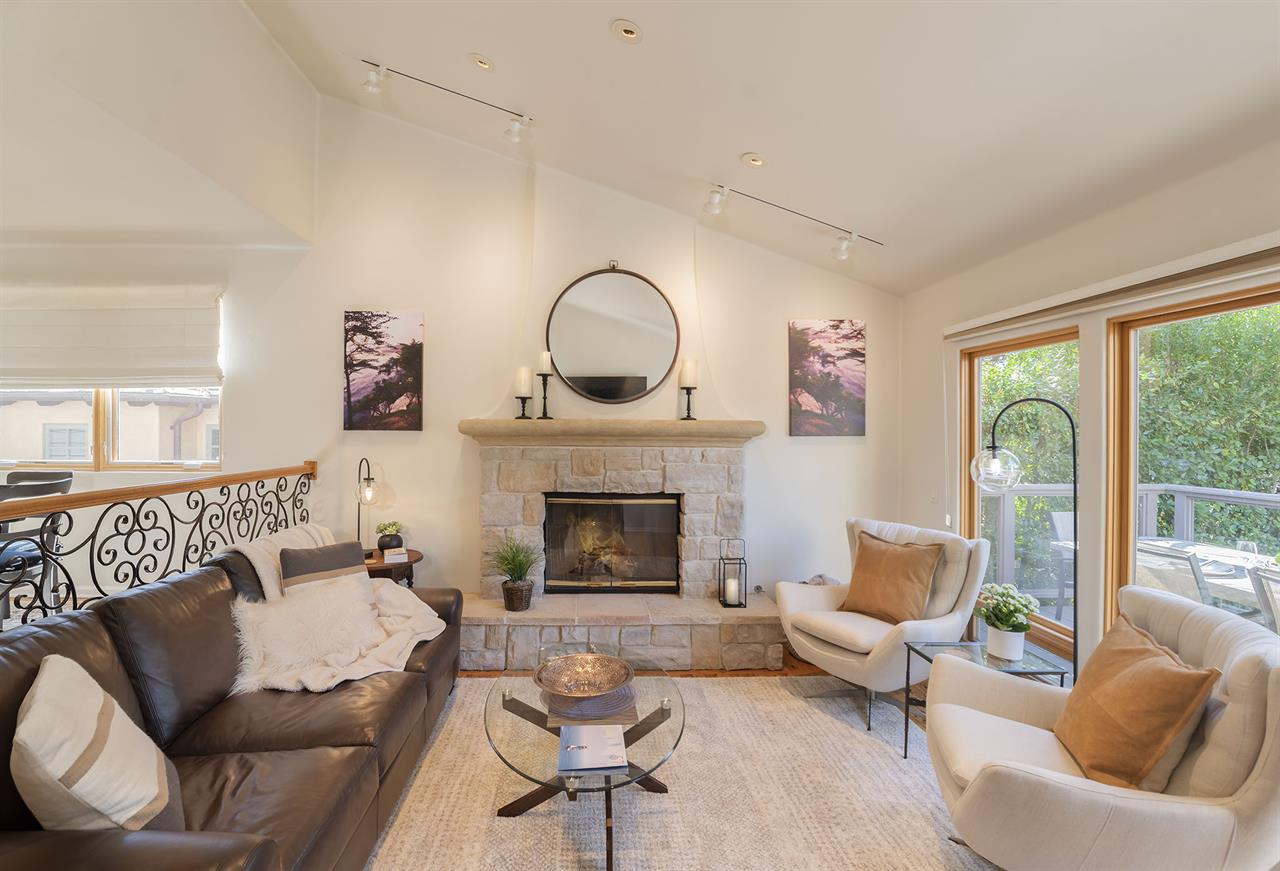 Living Room with Fireplace and Vaulted Ceilings