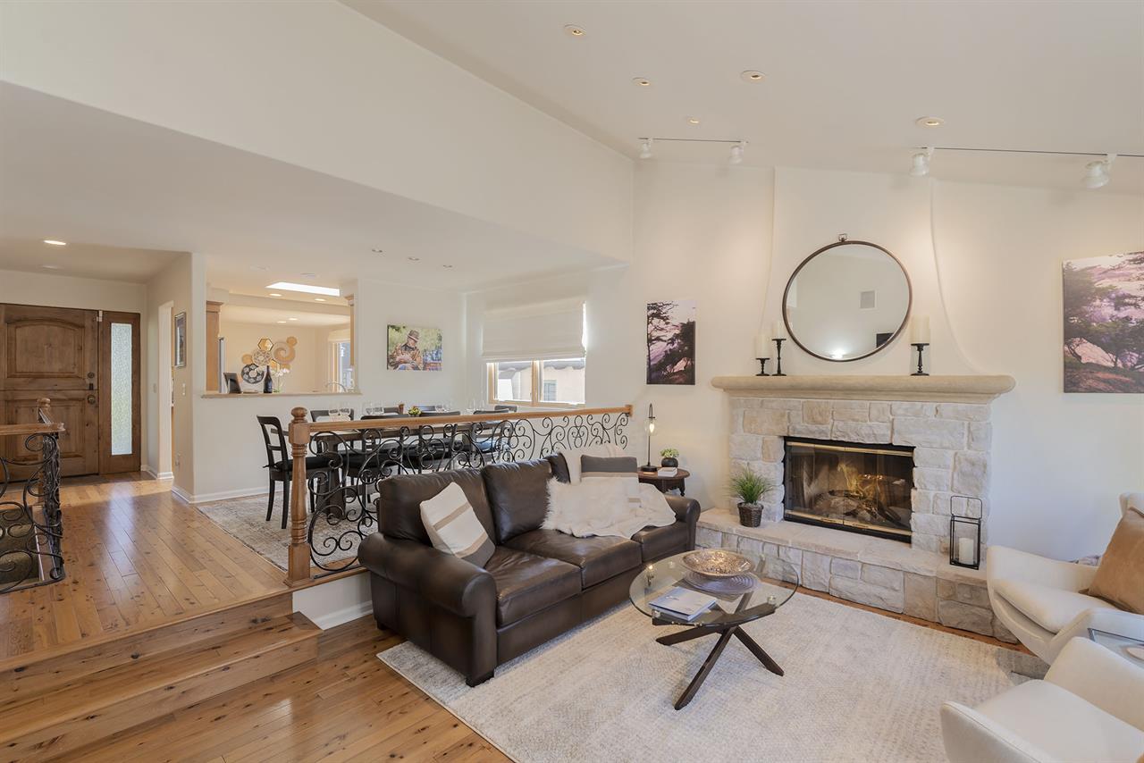 Living Room with Fireplace and Vaulted Ceilings