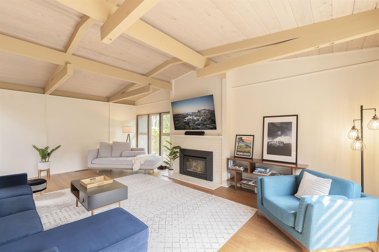 Living Room has a 65inch HDTV and Fireplace