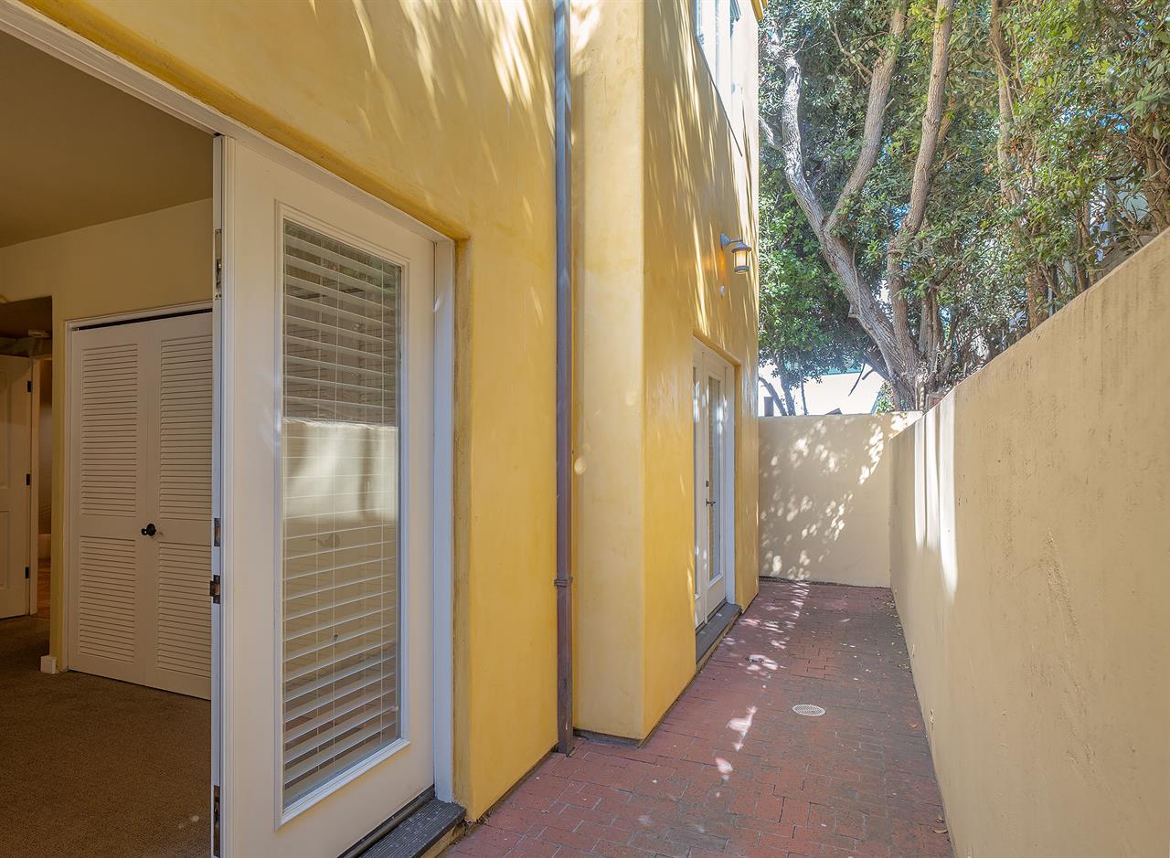 Both Bedrooms Have French Doors to Small Patio
