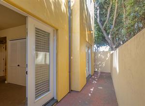 Both Bedrooms Have French Doors to Small Patio