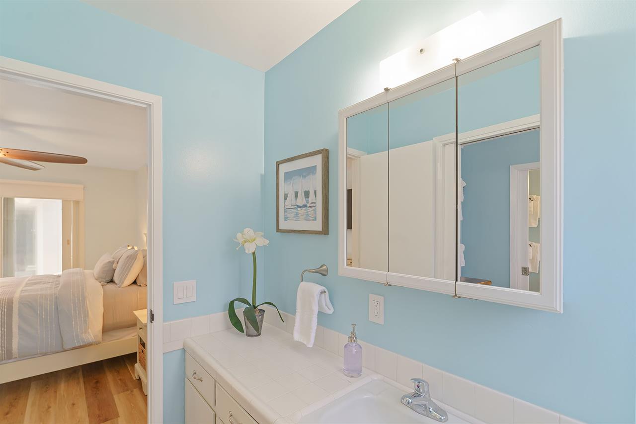 En Suite Powder Room Connects to Shared ShowerOverTub