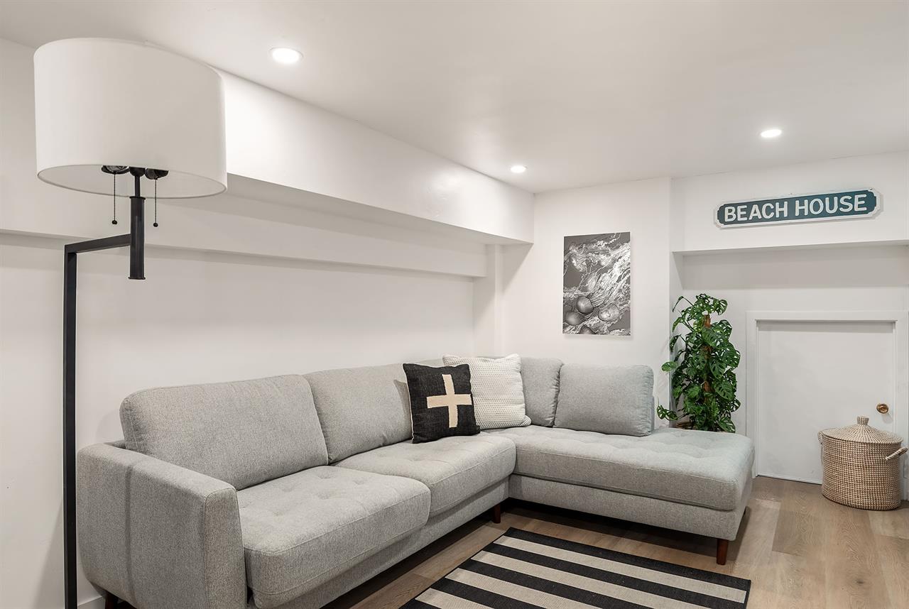 Den with a Queen Sofa Bed and 55 HDTV.