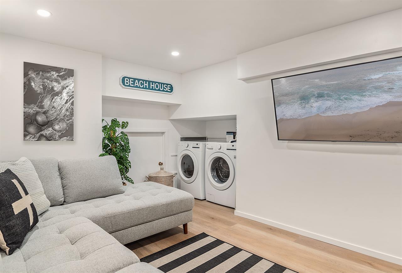 Den with Queen Sofa Bed, 55 HDTV  Washer and Dryer