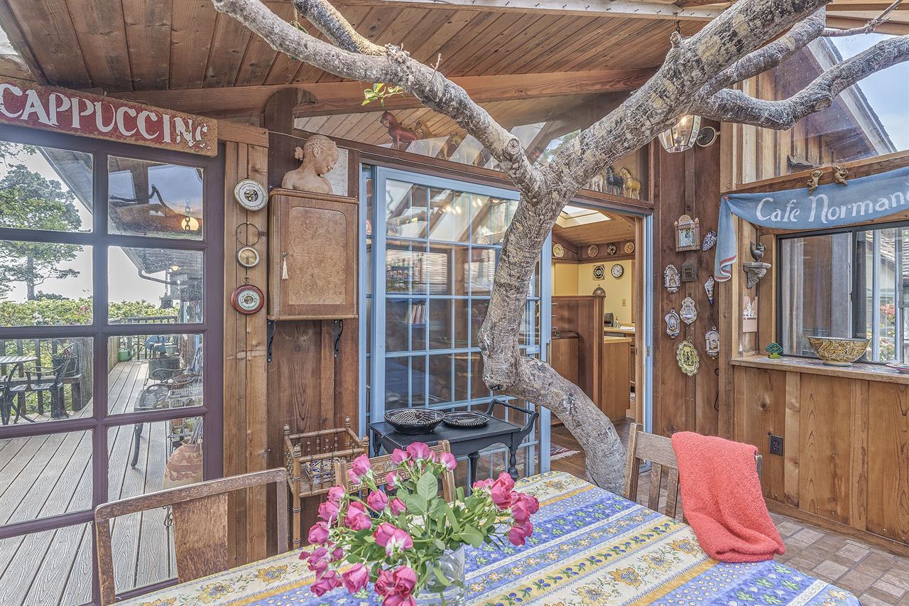 Enclosed Sun Porch with Live Tree