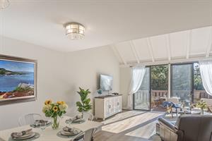Living Room with HDTV, Balcony and Vaulted Ceiling
