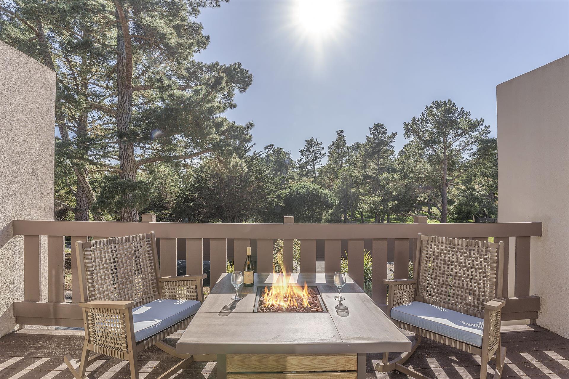 West Facing Balcony with Fire Pit Table and Seating