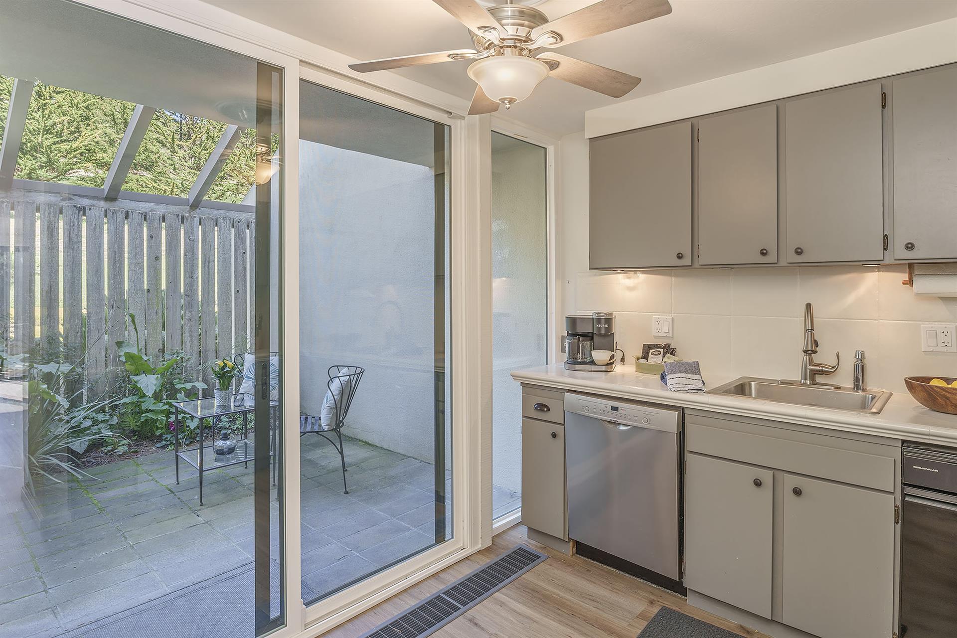 Fully Equipped Kitchen with Access to the Front Courtyard Patio