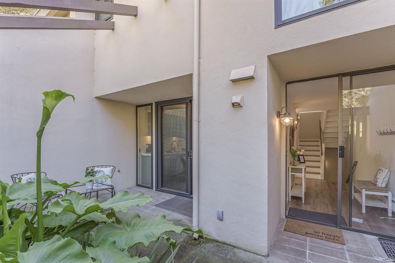 Front Patio with Access to the Kitchen and Front Entry