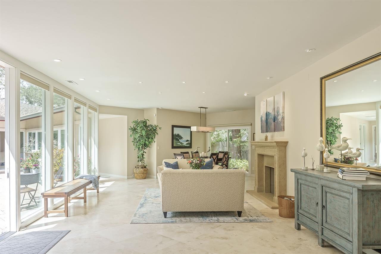 Living Room with Gas Fireplace and Dining Table