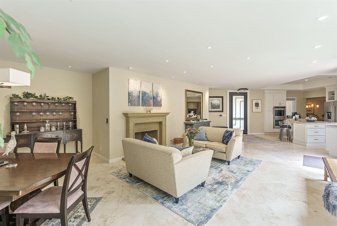 Living Room with Gas Fireplace and Dining Table